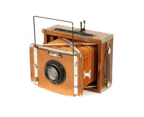 A Contessa-Nettle Tropical Deck-Rullo Camera, 1919-26, 9x12cm, teak, with Carl Zeiss Jena Tessar f/4.5 150mm lens, black, ser