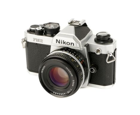 A Nikon FM2n SLR Camera, 1983-, chrome, serial no. 7855410, with Nikkor Ais f/1.8 50mm lens, black, serial no. 438283, body, 