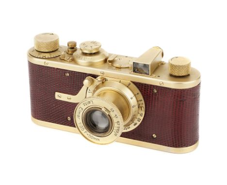 A Leica I Model A 'Luxus' Replica Camera, 1930, gold, serial no. 46812, with Leitz Elmar f/3.5 50mm lens, gold, body, VG, shu