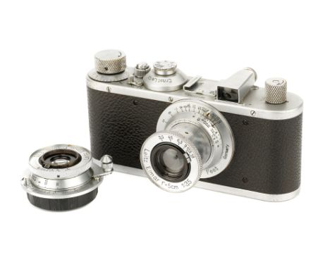 A Leica Standard Model E Camera, 1939, chrome, serial no. 322259, with Leitz Elmar f/3.5 50mm lens, 1937, chrome, serial no. 