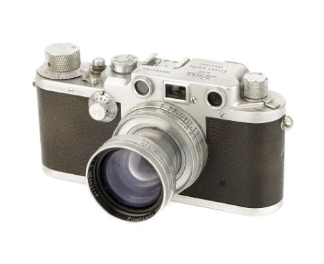 A Leica IIIc Rangefinder Camera, 1948/49, chrome, serial no. 460184, with Leitz Summitar f/2 50mm lens, 1948, chrome, serial 