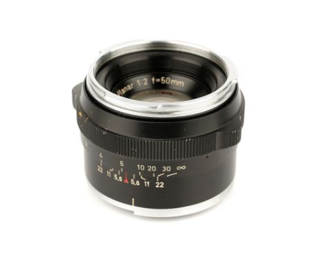 A Carl Zeiss Planar f/2 50mm Lens, Contarex, black paint, serial no. 3180338, body, VG, elements, VG-E, some very light inter