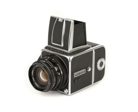 A Hasselblad 500C/M Camera, 1970-94, black, with Carl Zeiss Planar T* f/2.8 80mm lens, black, serial no. 6385192, body, VG, l