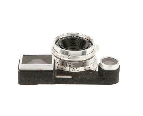 A Leitz Summaron f/2.8 35mm Lens, 1959, with ocular attachment, chrome, serial no.1666963, body, G-VG, elements, G-VG, some l