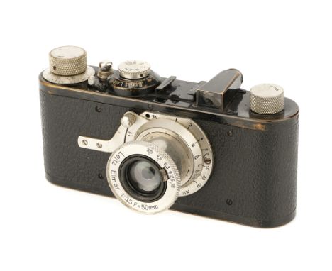 A Leica I Model A Camera, 1928, black, serial no. 5652, with Leitz Elmar f/3.5 50mm lens, nickel, body, G-VG, shutter working