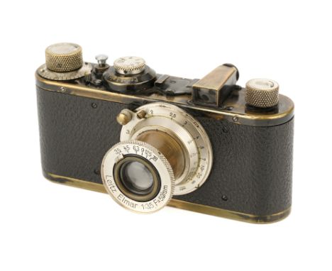 A Leica I Model C Camera, 1930, black, serial no. 61734, with Leitz Elmar f/3.5 50mm lens, nickel, body, G, shutter working, 