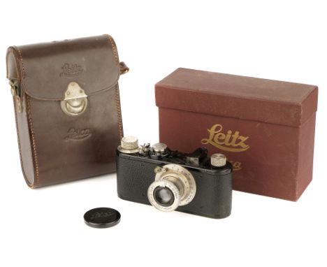 A Leica I Model C Camera, 1931, black, serial no. 65719, with Leitz Elmar f/3.5 50mm lens, nickel, body, VG, shutter working,