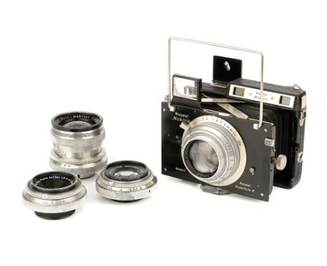 A Plaubel Makina II (b) Rangefinder Camera, 1946-48, black, serial no. k45/049, with Anticomar f/2.9 100mm lens, chrome, seri