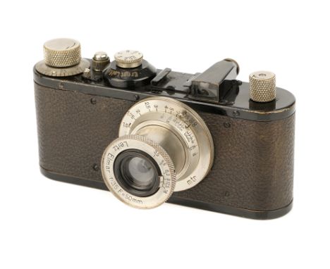 A Leica Standard Model E Camera, 1936, black/nickel, serial no. 200692, with Leitz Elmar f/3.5 50mm lens, 1932, nickel, seria