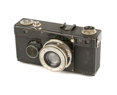A Zeiss Ikon Contax Ib Rangefinder Camera, 1932-36, black, serial no. V32855, with Carl Zeiss Jena Tessar f/2.8 50mm lens, ni