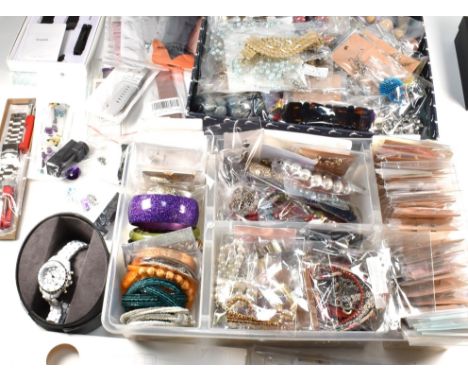 Large collection of costume jewellery and watch straps and watch tools. The jewellery to include earrings, bangles, bracelets