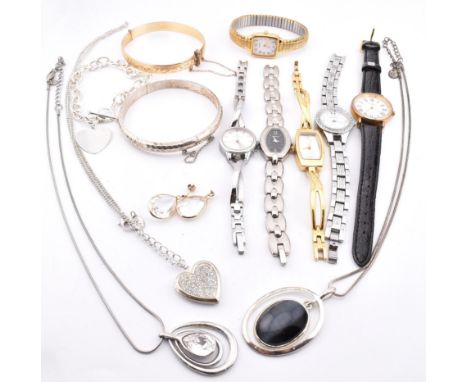 



A collection of costume jewellery and wristwatches. The lot to include dress watches bracelet, pendant earrings, lockets,