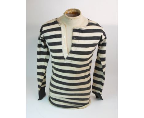 A BLACK AND WHITE QUEEN'S PARK FOOTBALL SHIRT with button-up collar and two black and white photographs of Gordon Hoare weari