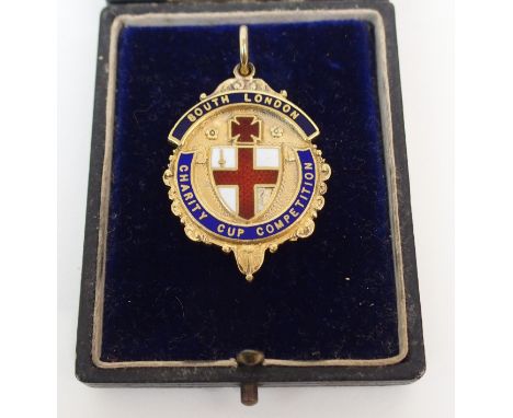 A SILVER-GILT AND ENAMEL SOUTH LONDON FOOTBALL MEDAL the obverse inscribed South London, Charity Cup Competition, the reverse