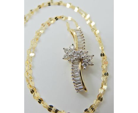 AN ILLIANA DESIGNED 18CT YELLOW GOLD DIAMOND PENDANT estimated approx diamond content 0.50cts, length of pendant 2.2cm, on an