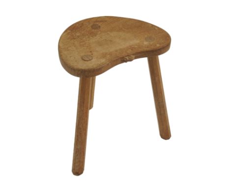 A ROBERT "MOUSEMAN" THOMPSON THREE LEGGED OAK STOOL with kidney shaped top, with signature mouse, 45cm high Condition Report: