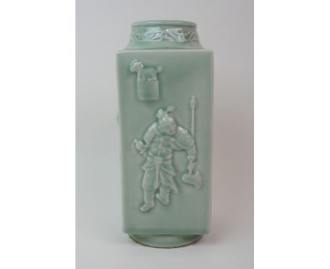 A CHINESE CELADON CONG VASE moulded with figures and symbols with foliate neck and ring foot, Yongzheng mark but later, 29.5c