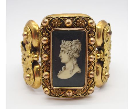 A HIGH GOTHIC COSTUME JEWELLERY BANGLE with painting of a Queen on parchment under glazed panel, inner diameter approx 5.8cm.