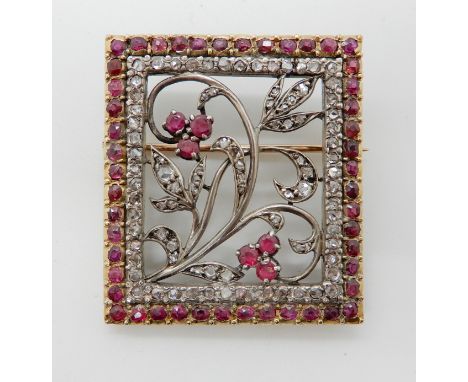 A ROSE CUT DIAMOND AND RUBY FLORAL BROOCH dimensions 3.5cm x 3cm, weight 13gms Condition Report: All rose cut diamonds in sit