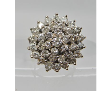 A BRIGHT YELLOW METAL DIAMOND CLUSTER RING in classic basket mount, set with estimated approx 1.80cts of brilliant cut diamon