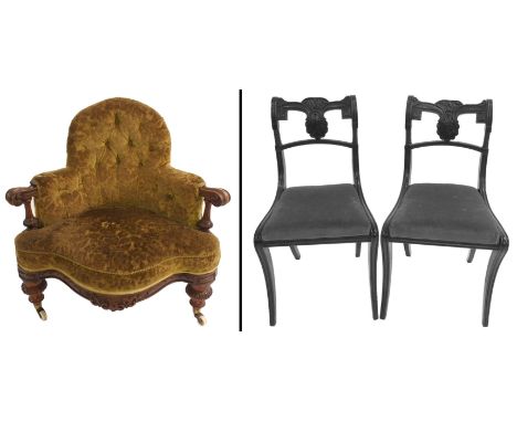 A VICTORIAN WALNUT LADIES PARLOUR CHAIR the button back joined by scroll arms and fluted pillars above a scroll seat and with