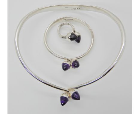A SUITE OF DANISH SILVER JEWELLERY WITH AMETHYST ACORN FINIALS BY BENT KNUDSEN the torc style necklace with cross over acorn 