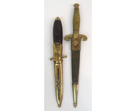 A SWEDISH HUNTING KNIFE marked on the blade and brass scabbard C. W. Dahlgren No. 43A, 23.5cm overall length with another dag