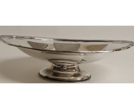 A SILVER PEDESTAL DISH by Charles S Green &amp; Company Limited, Birmingham 1961, of oval shape, the faceted body with a band
