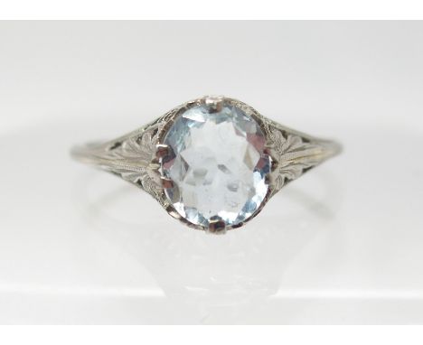 A 10K WHITE GOLD ART DECO STYLE AQUAMARINE RING with pierced setting and shoulders, aquamarine approx 8.30mm x 7.06mm, finger