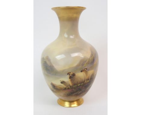 A ROYAL WORCESTER VASE of baluster shape, painted with sheep in a rocky mountain landscape, signed H Davis, with gilt to uppe