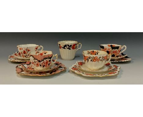 Wileman and co 'Japan' pattern jubilee flute moustache cup, c.1886; a group of four tea cup trios including; 'Daisy wreath' p
