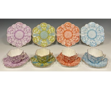 A Group of three Wileman and Co. Daisy-shape trios, and a conforming late Foley Shelley trio, snow drop pattern, nos. 9177, 9