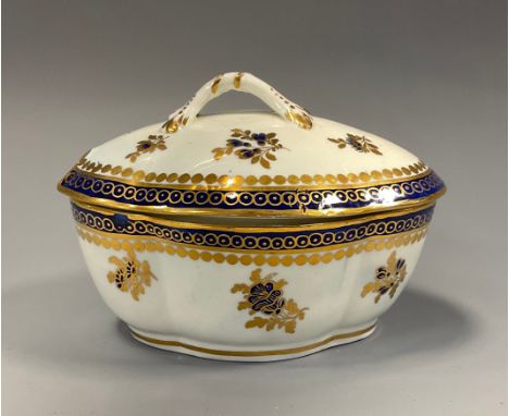 An 18th century Caughley porcelain shaped oval sauce tureen and cover, decorated with blue and gilt flowers, marked S in blue