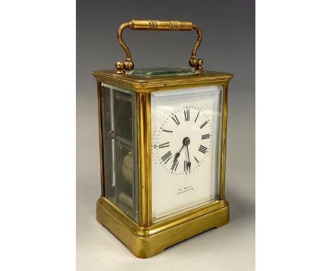 A W Bell Lancaster carriage clock, white dial, Roman numerals, manual wind spiral gong striking movement, 17cm high, 9cm wide