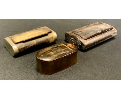 A 19th century horn armorial snuff box, hinged cover stamped with a heraldic crest, 7cm long, c.1840; others, probably Scotti
