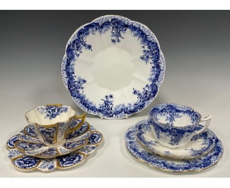 Two Wileman and Company tea cup trios; pattern 'Rose', no. 6924, c.1896; pattern 'Fern' no. 9122, and a fern pattern dinner p