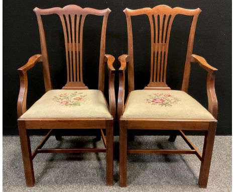 A set of eight Chippendale revival 19th century mahogany chairs, wheat-sheaf splats, serpentine arms, tapestry upholstered dr