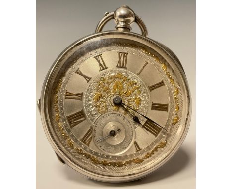 A Continental 935 silver open face pocket watch, silver dial, gilt Roman numerals, ornate swags, subsidiary seconds, key wind