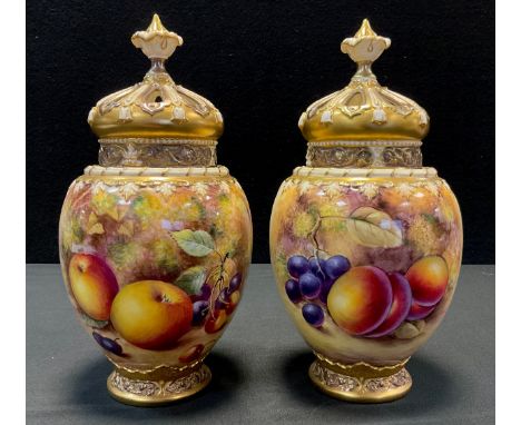 A Pair of Royal Worcester Pot Pourri crown top vases, with covers, pattern number 2048, each decorated with ripe fruits on a 