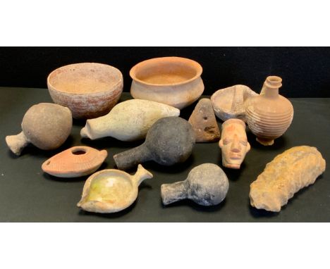 Antiquities - An early Persian glazed open oil lamp of lipped circular form, 12cm long; a 'Roman' Palestinian terracotta oil 