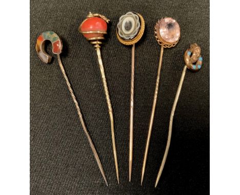 A Victorian cameo oval panel topped tie pin, others, pale pink (possibly topaz), Serpent coiling round a coral red bead;  aga
