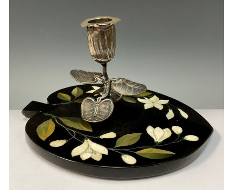 An Ashford marble Lily pad chamber stick, silver plated sconce as an opening flowerhead above four leaves, within floral base