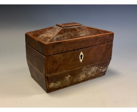 A George III burr yew sarcophagus tea caddy, hinged cover enclosing a pair of lidded compartments, outlined throughout with b