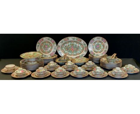 An extensive 20th century Chinese dinner set, decorated in the Famille vert palet inc dinner, side and dessert plates, bowls,