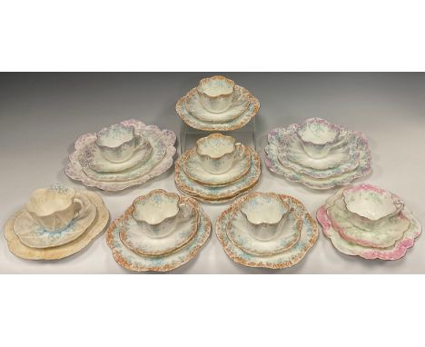 A Wileman and Co. pattern 'Trailing violets', pattern no.9058 part tea set for four comprised of dainty-shaped tea cups and s