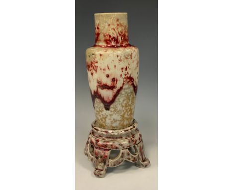 A Ruskin Pottery high-fired stoneware vase and stand, designed by William Howson Taylor, of slender shouldered form with cyli