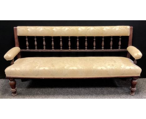 A Victorian mahogany Railway sofa, upholstered top rail with turned spindle supports to back, sprung seat, turned legs, 87cm 