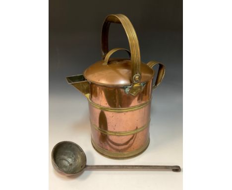 An early 20th century brass banded watering can and cover, square spout, folding carrying handle, 54cm high, 28cm diameter, 1