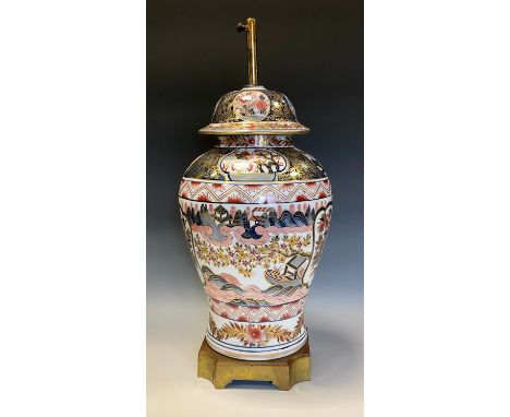 A large baluster vase, painted in the Imari palette, gilt metal mounted as a table lamp, 50cm to base of fiitting, 19th centu