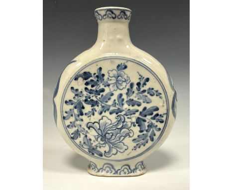 A Chinese moon flask, painted in tones of underglaze blue with chrysanthemums and scrolling leaves, 17cm high, 19th/early 20t